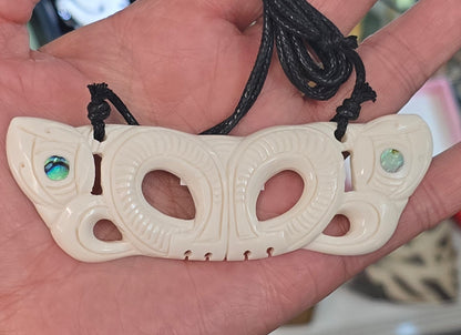 Bone necklace carving