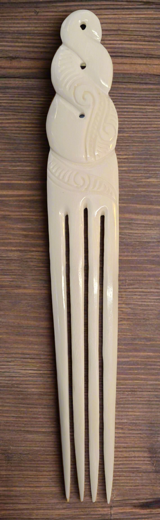 Heru bone hair comb